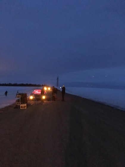 A roadside production setup at dusk